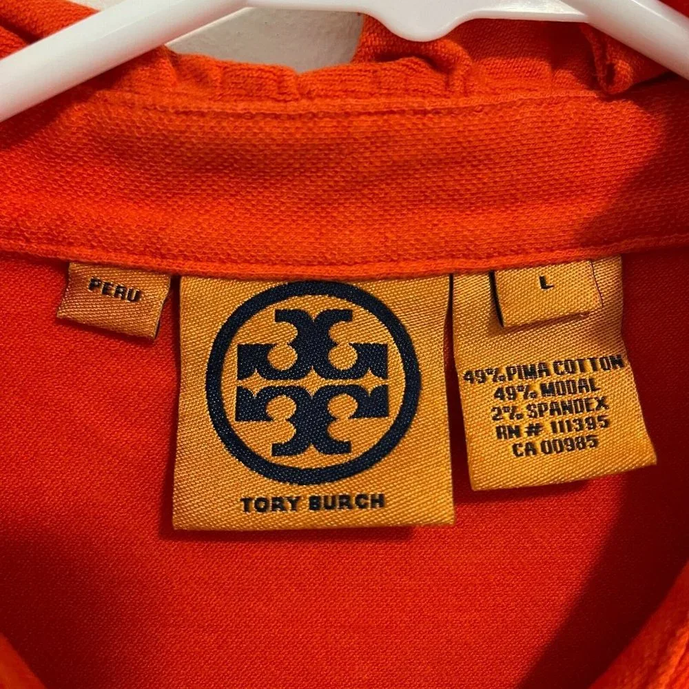 Tory Burch Orange Ruffle Polo Top